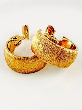 Vintage Monet Gold Tone Wide Textured Huggie Hoop Clip On Earrings
